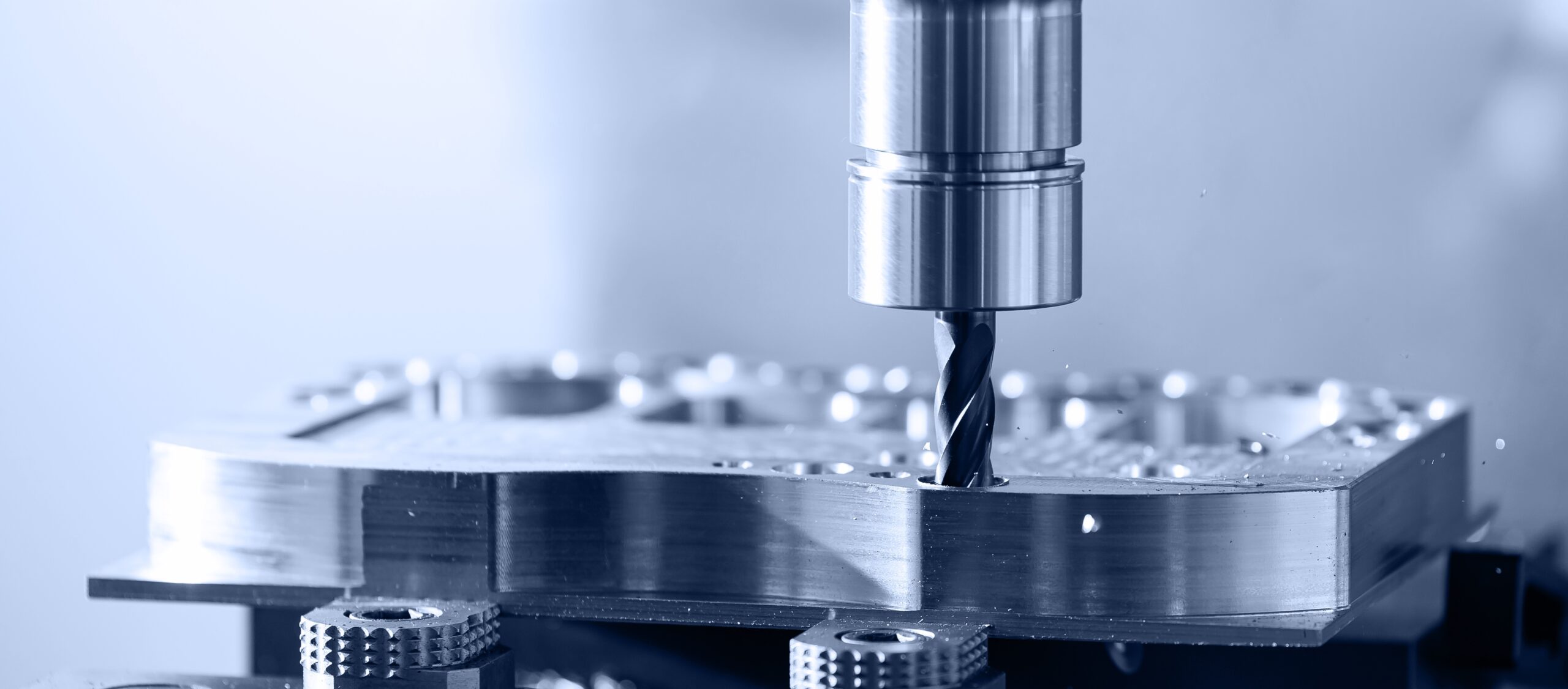 Modern,Cnc,Milling,Machine,During,Operation.,Produced,Cutting,Metal,Parts,